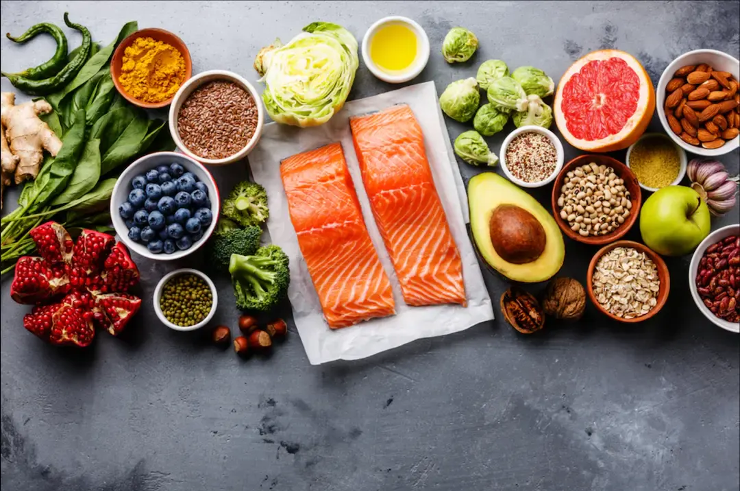 Fresh whole foods laid out for FP Fitness nutrition coaching